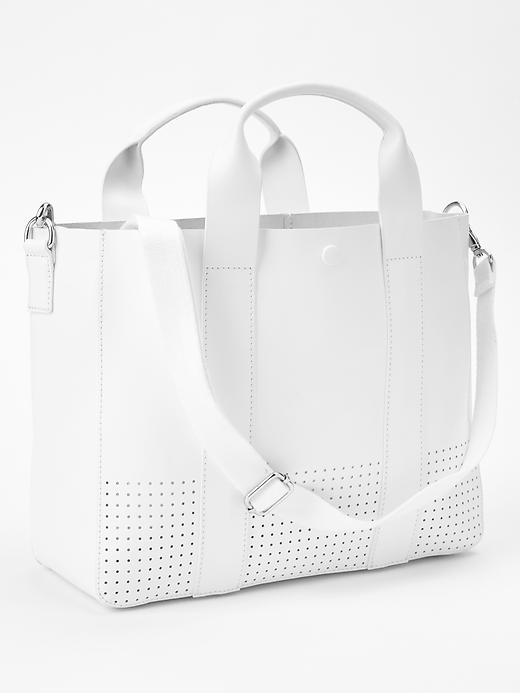 View large product image 1 of 2. Perforated leather tote crossbody