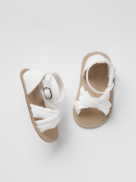 View large product image 1 of 1. Cross strap sandals