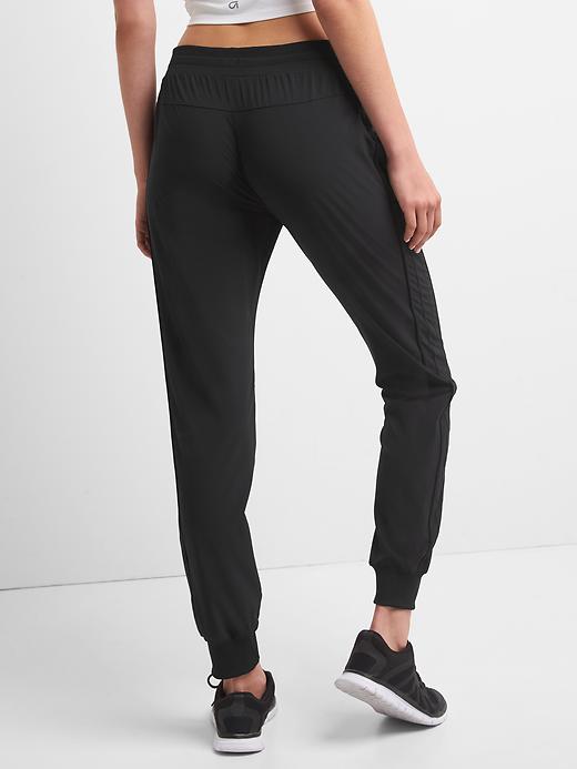 View large product image 2 of 6. GapFit Studio Side-Stripe Joggers