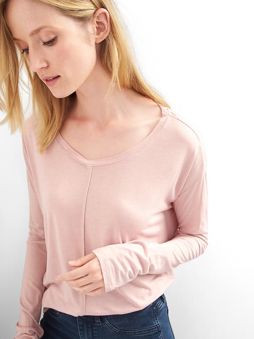 View large product image 1 of 1. Drapey long sleeve tee