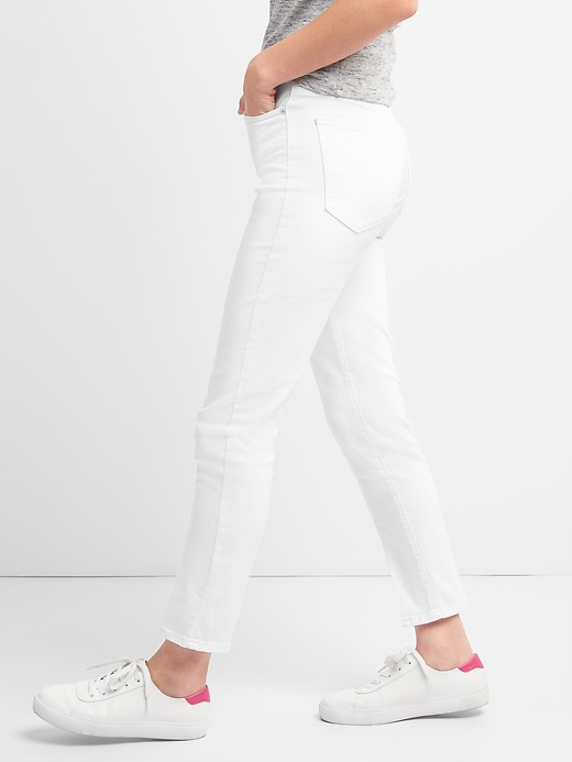 Image number 5 showing, High Rise True Skinny Ankle Jeans with Slit Hem