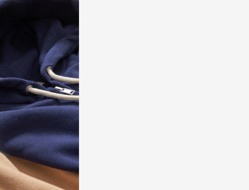 Close-up of a blue zip-up hoodie