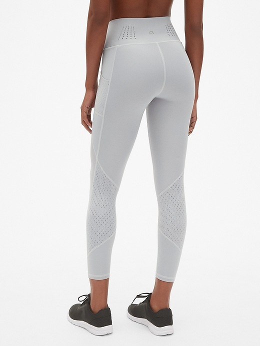 View large product image 2 of 7. GapFit High Rise Perforated Pocket 7/8 Leggings in Sculpt Revolution