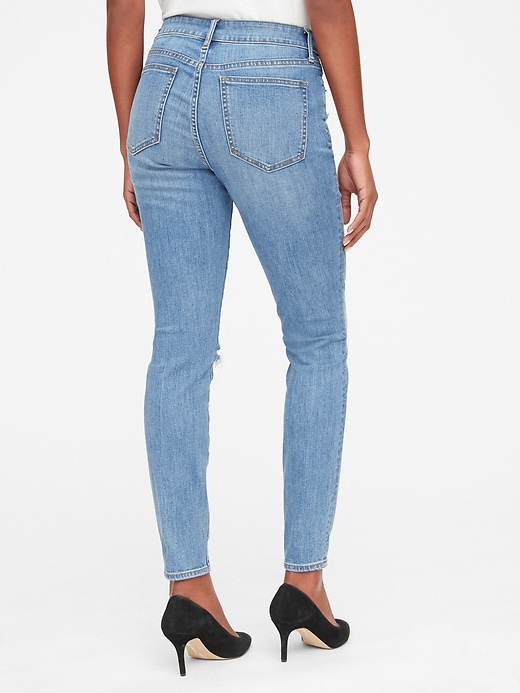 Image number 2 showing, Mid Rise Curvy True Skinny Jeans with Distressed Detail
