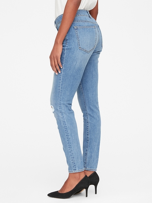 Image number 1 showing, Mid Rise Curvy True Skinny Jeans with Distressed Detail