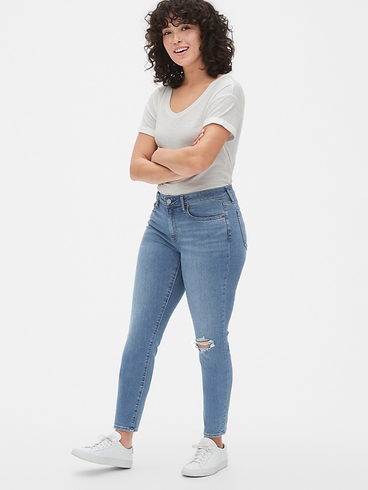 Image number 7 showing, Mid Rise Curvy True Skinny Jeans with Distressed Detail