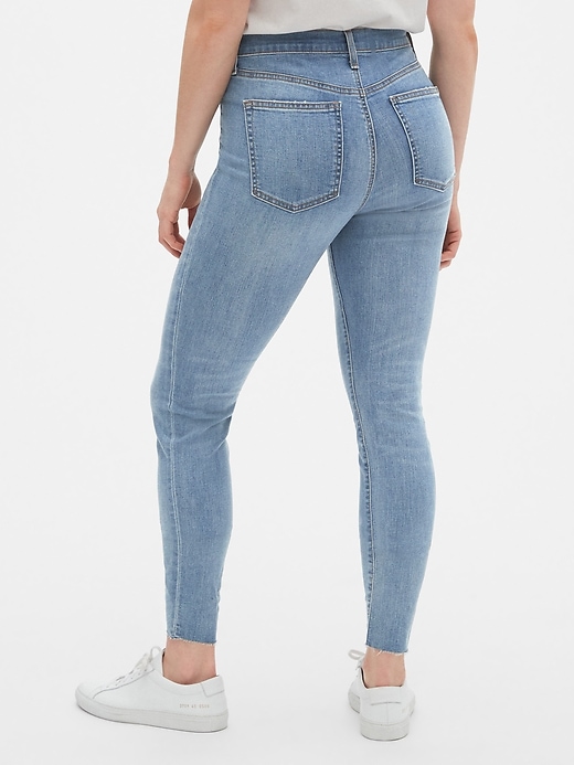 Image number 2 showing, High Rise True Skinny Jeans with Secret Smoothing Pockets