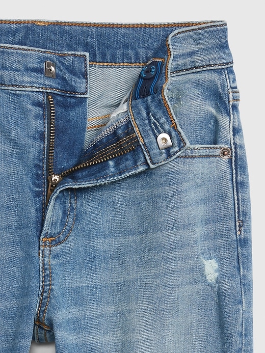 Image number 4 showing, Kids Destructed Athletic Taper Jeans with Washwell&#153