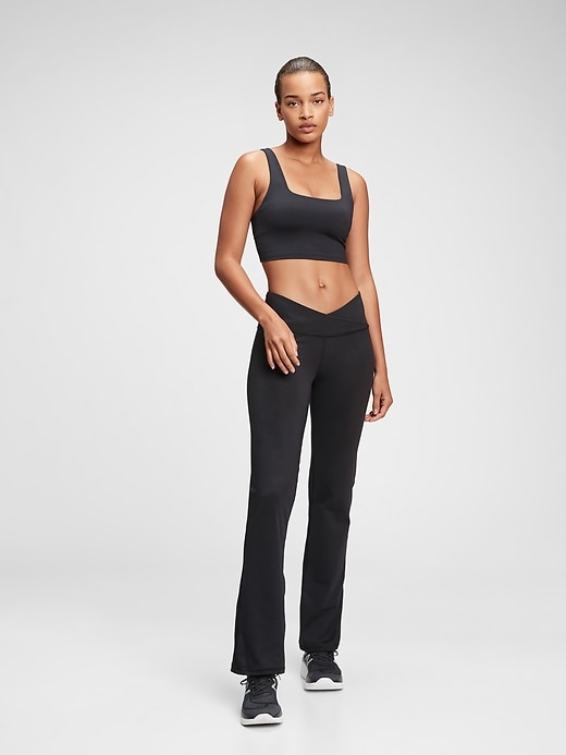 View large product image 1 of 7. GapFit Blackout Flare Pants