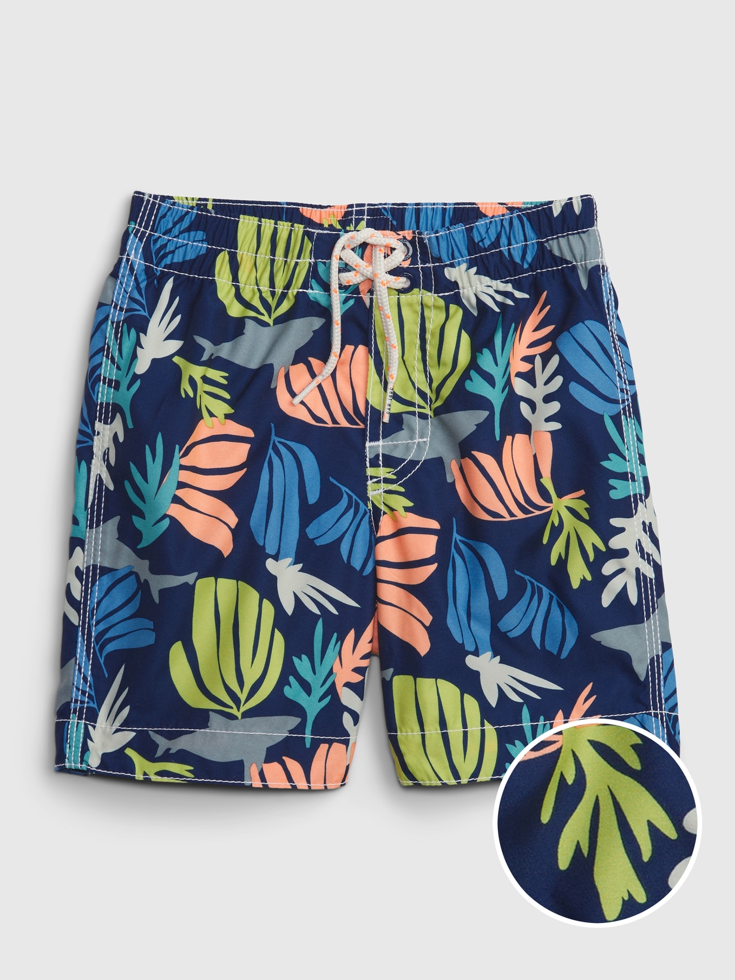 Gap Toddler 100% Recycled Graphic Swim Trunks blue. 1