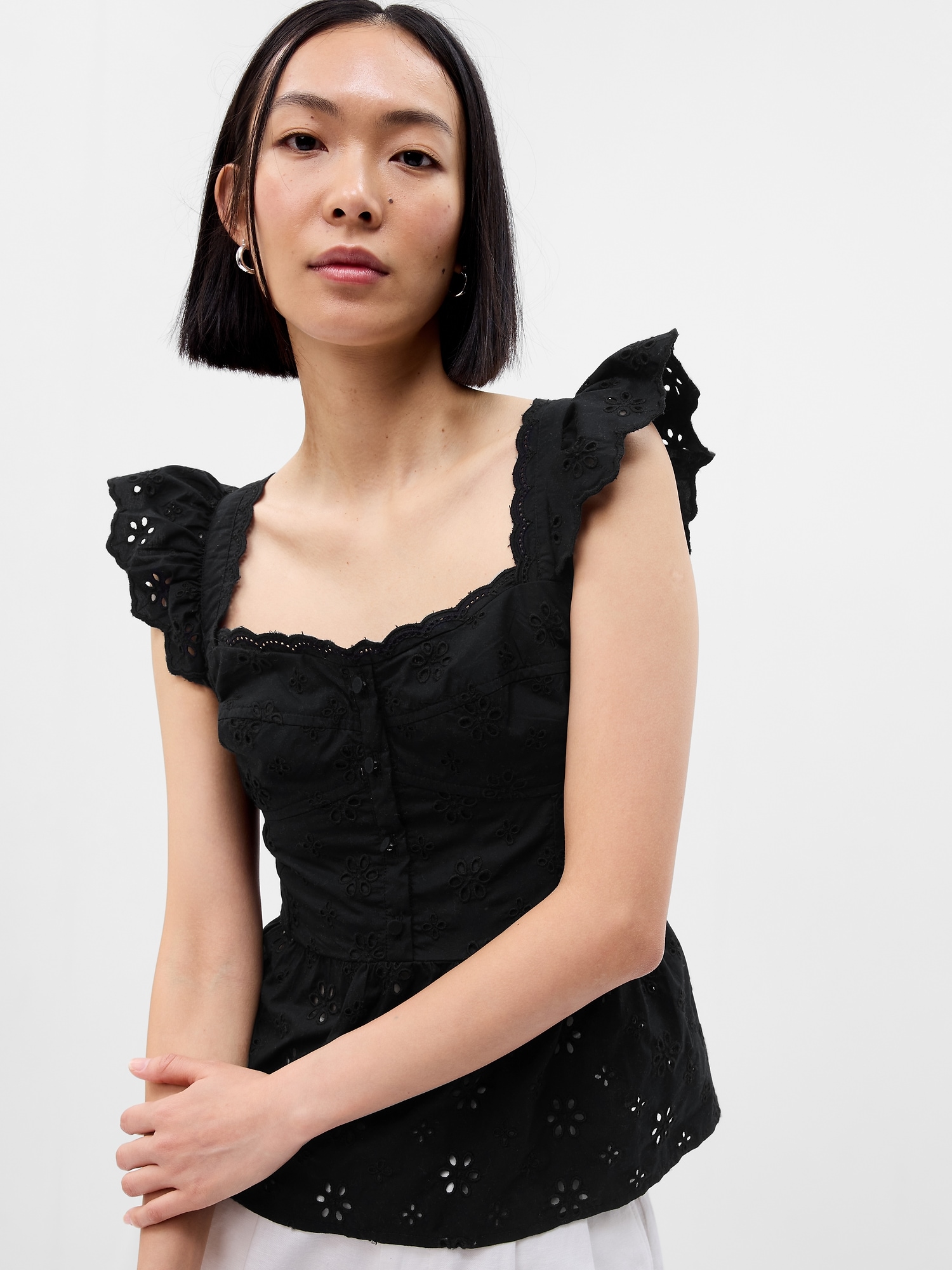 Gap Eyelet Corset Peplum Top black. 1 Gap Eyelet Corset Peplum Top black. 1