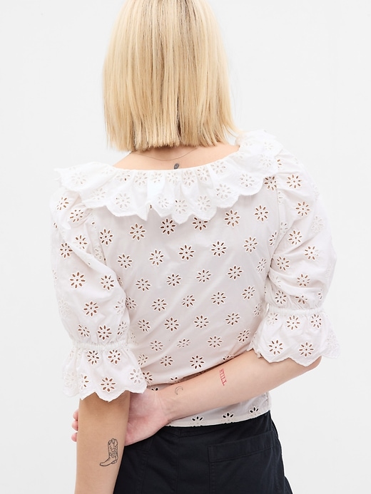 white ruffle top
