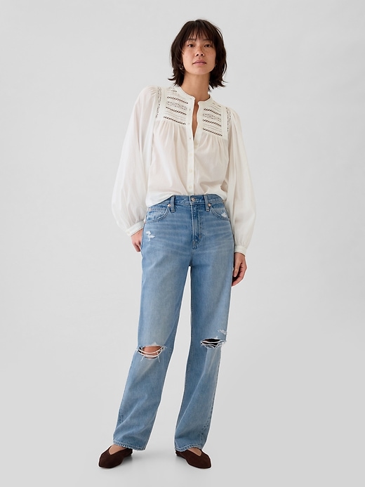 L'image numéro 3 présente Chemisier à dentelle à manches bouffantes