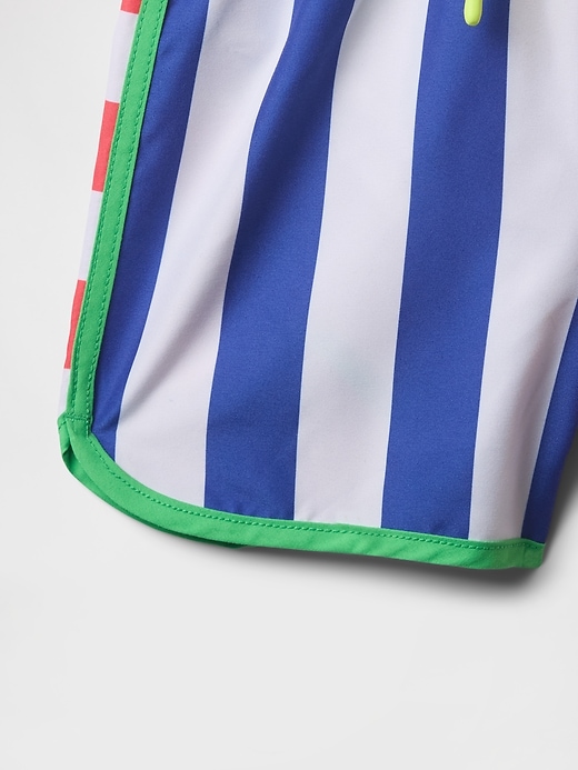 Image number 3 showing, Baby & Toddler Recycled Dolphin Hem Swim Trunks