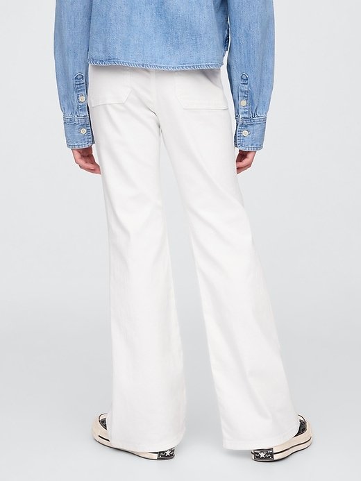 L'image numéro 4 présente Jean évasé années 1970 à taille haute pour Enfant