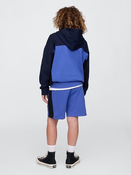 L'image numéro 3 présente Short GapSport Tech pour Enfant, entrejambe de 13 cm