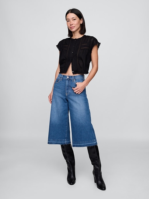 L'image numéro 1 présente Jean gaucho en denim à taille haute