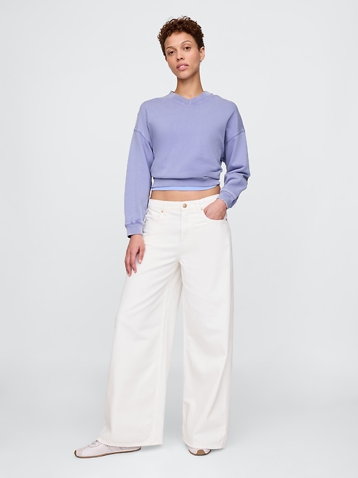 L'image numéro 1 présente Jean ballon très ample à taille mi-basse ample