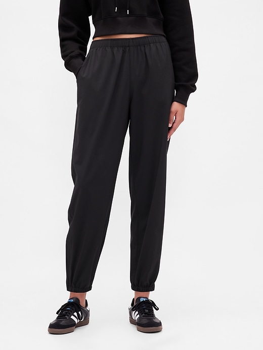 Image number 2 showing, GapFit Tech High Rise Zip-Hem Joggers