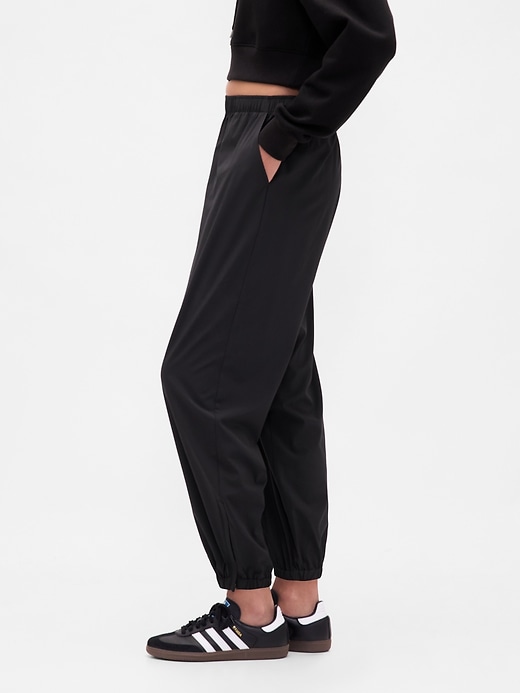 Image number 3 showing, GapFit Tech High Rise Zip-Hem Joggers