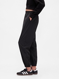 Image number 3 showing, GapFit Tech High Rise Zip-Hem Joggers