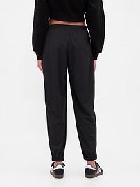 Image number 4 showing, GapFit Tech High Rise Zip-Hem Joggers