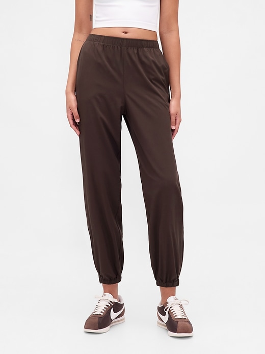 Image number 2 showing, GapFit Tech High Rise Zip-Hem Joggers