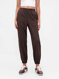 Image number 2 showing, GapFit Tech High Rise Zip-Hem Joggers
