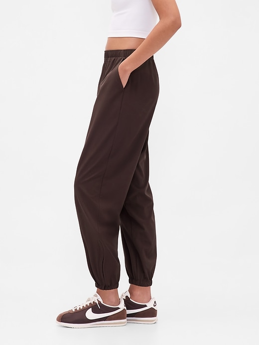 Image number 3 showing, GapFit Tech High Rise Zip-Hem Joggers