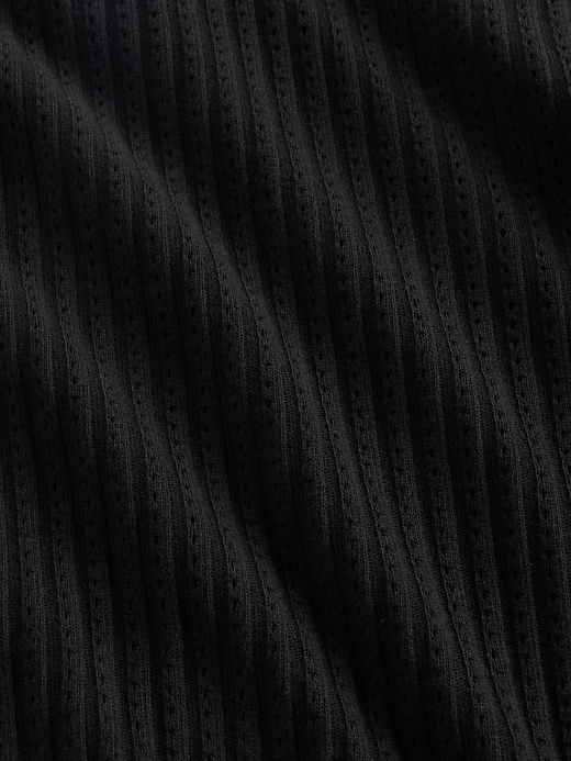 L'image numéro 4 présente Col roulé en maille pointelle côtelée