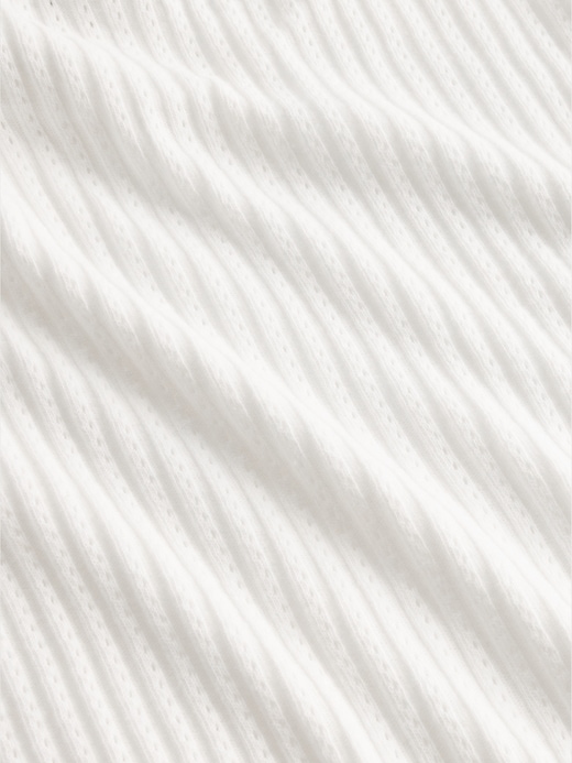 L'image numéro 4 présente Col roulé en maille pointelle côtelée