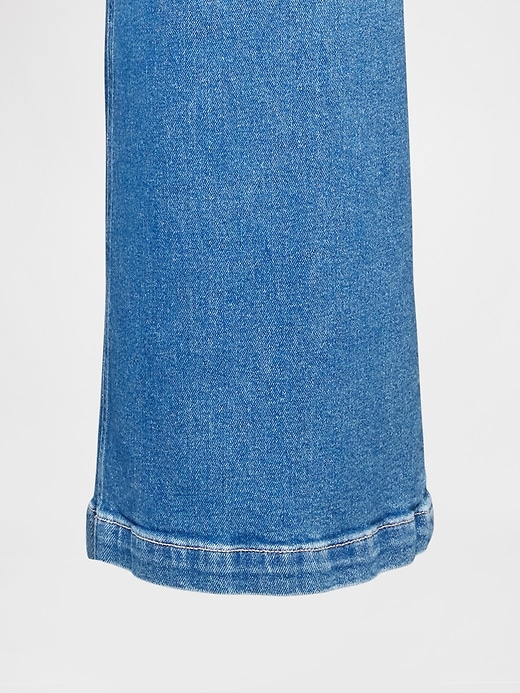 L'image numéro 8 présente Jean sportif à jambe large à taille très haute