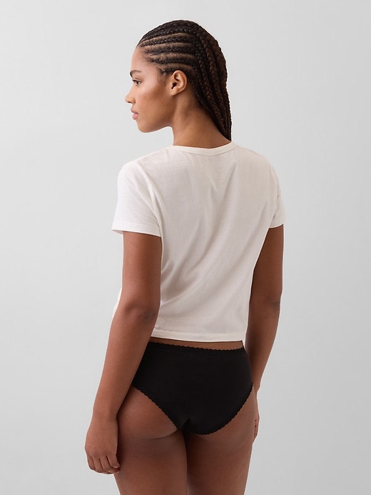 L'image numéro 2 présente Culotte taille basse en coton biologique extensible à bordure en dentelle