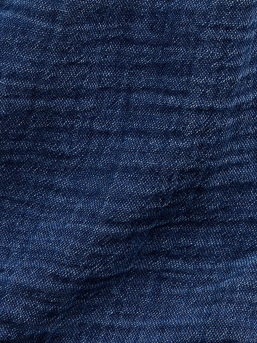 L'image numéro 6 présente Short confort en denim de gaze de coton à volants pour Enfant