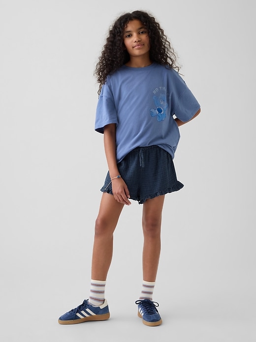 L'image numéro 1 présente Short confort en denim de gaze de coton à volants pour Enfant