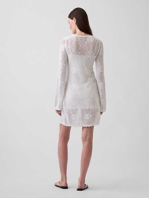 L'image numéro 2 présente Robe-chandail courte en tricot pointelle