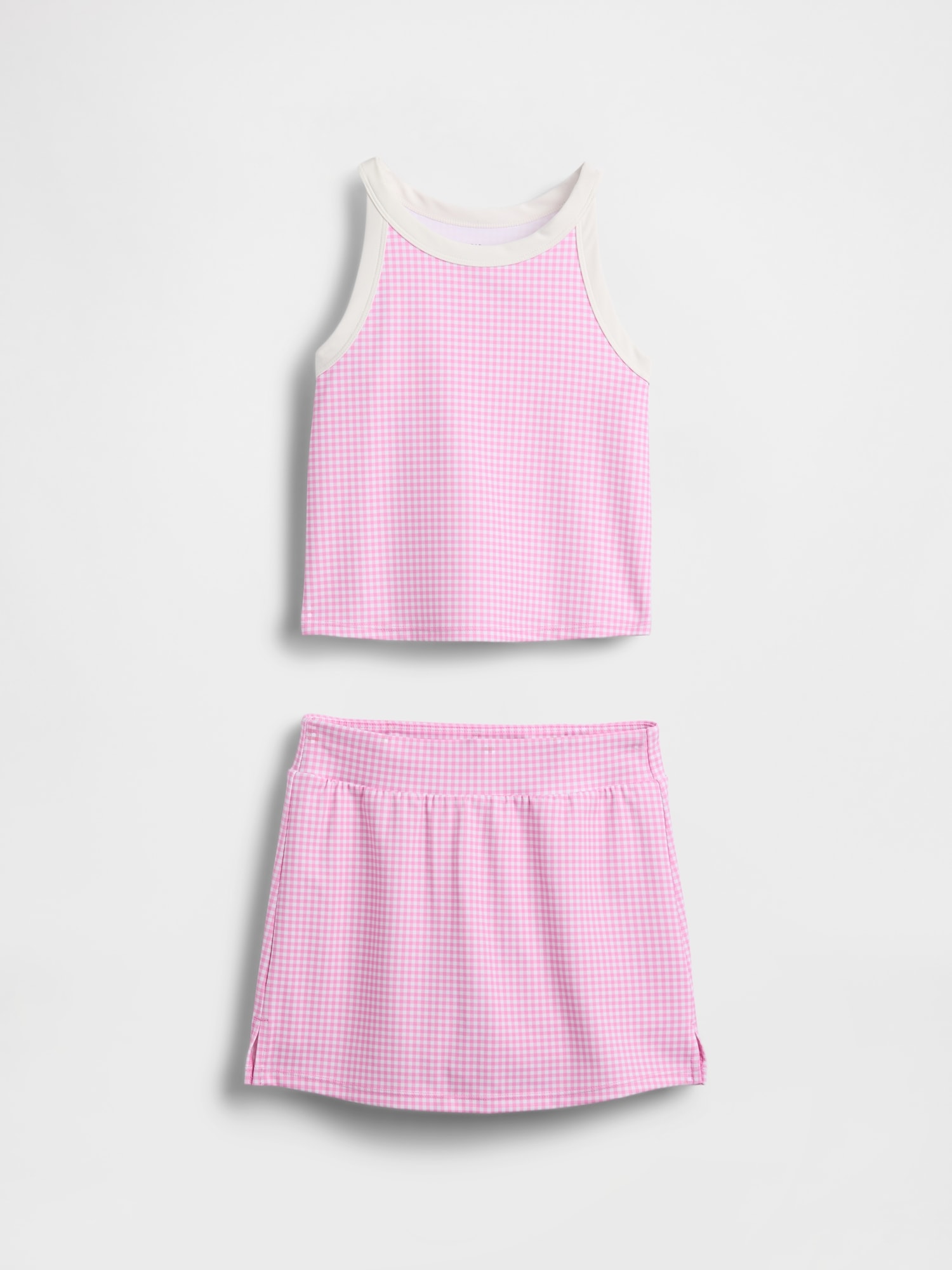 ENSEMBLE DE SPORT AVEC JUPE-SHORT POUR ENFANT