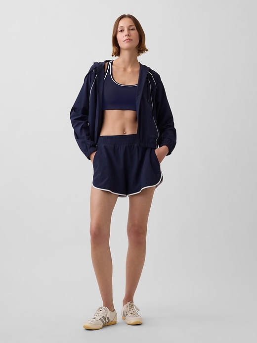 Image number 4 showing, GapFit Smooth Medium Impact Racerback Sports Bra