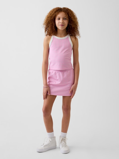 ENSEMBLE DE SPORT AVEC JUPE-SHORT POUR ENFANT