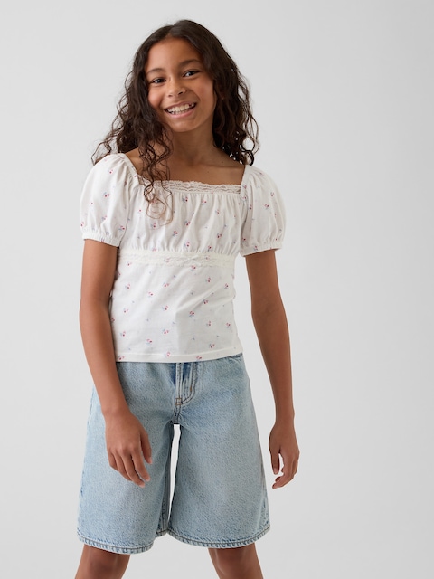 HAUT À MANCHES BOUFFANTES BORDURE EN DENTELLE POUR ENFANT