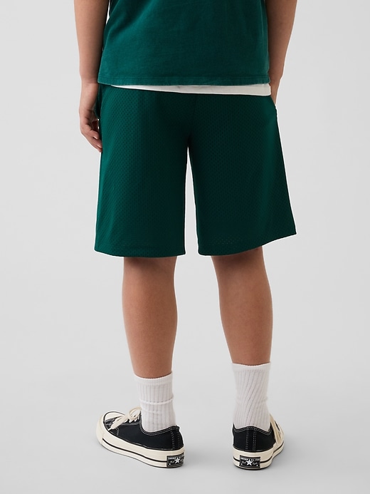 L'image numéro 4 présente Short de sport en maille pour Enfant, entrejambe de 20 cm