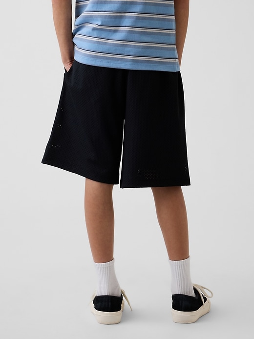 L'image numéro 4 présente Short de sport en maille pour Enfant, entrejambe de 20 cm