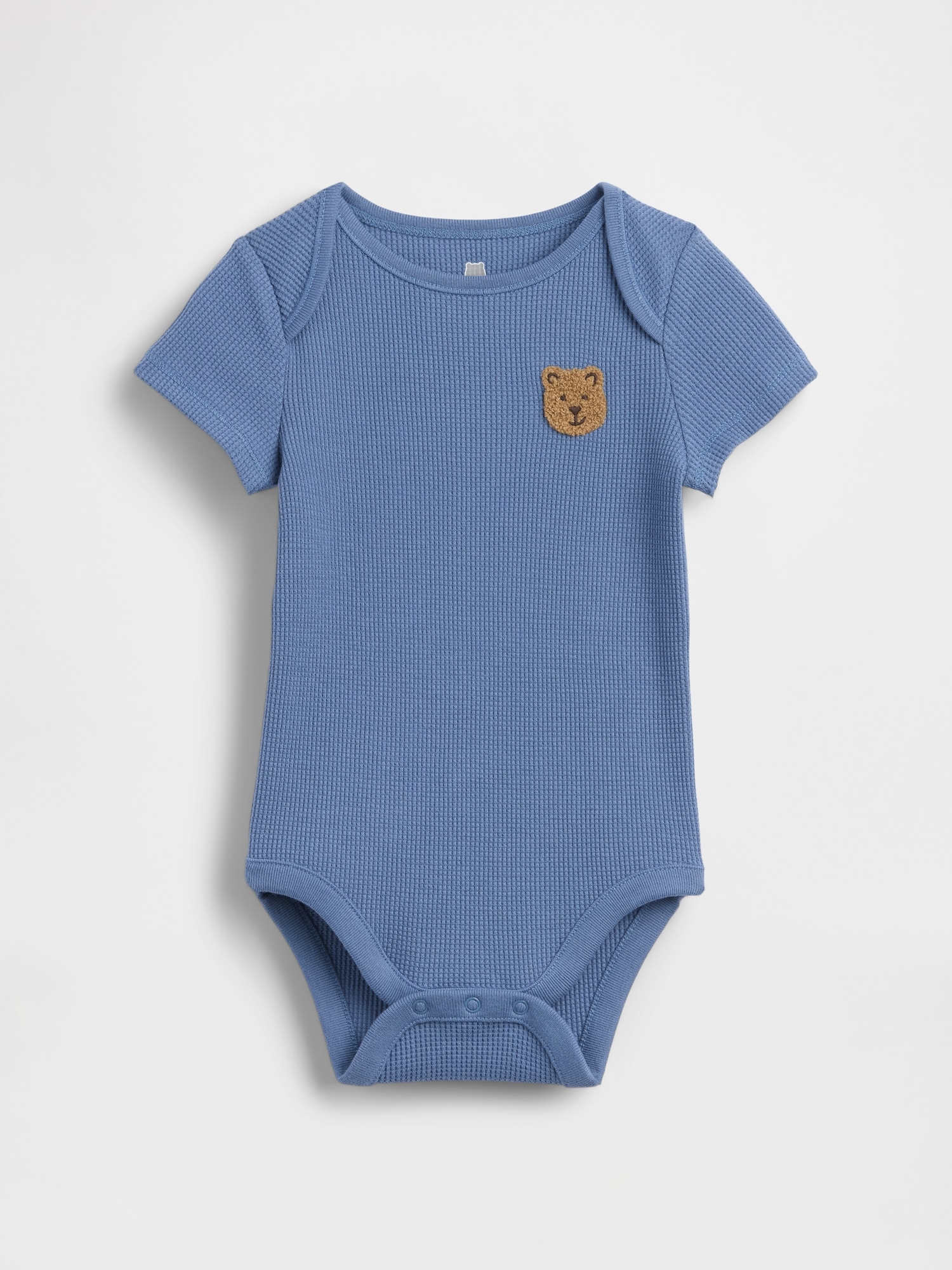Cache-couche gaufré Premiers essentiels pour Béb
