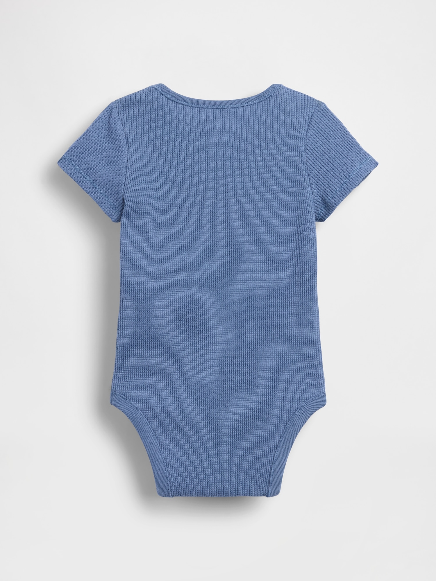 Cache-couche gaufré Premiers essentiels pour Béb
