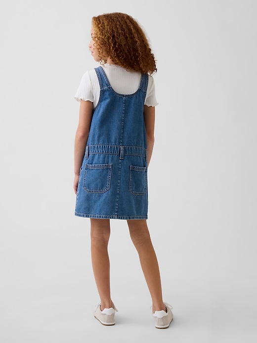 L'image numéro 3 présente Jupe-salopette en denim pour Enfant