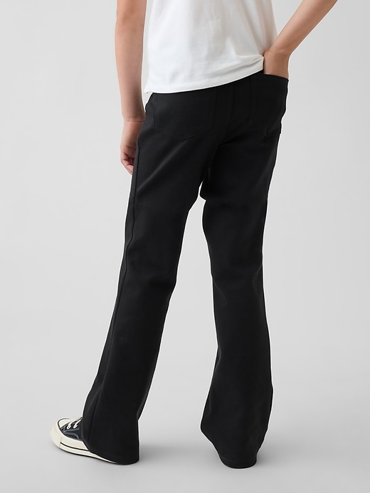 L'image numéro 4 présente Pantalon d’uniforme évasé en tricot point de Rome pour Enfant