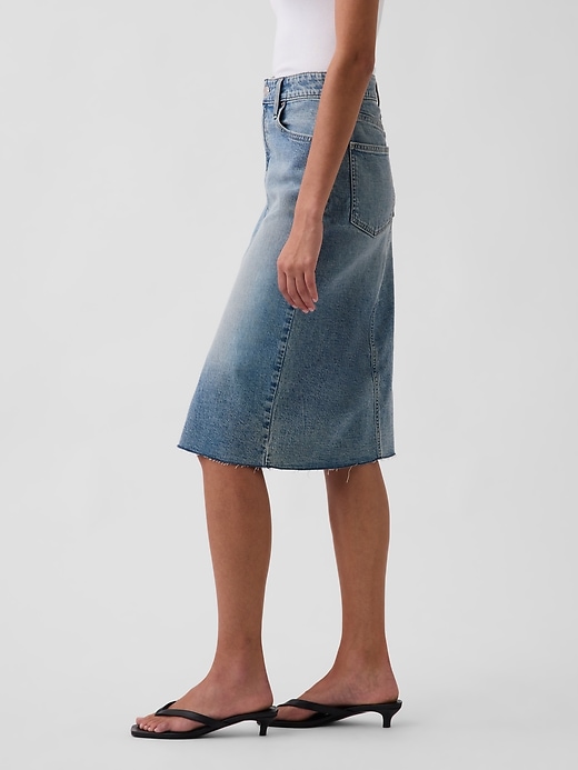 L'image numéro 3 présente Jupe droite mi-longue à taille haute en denim