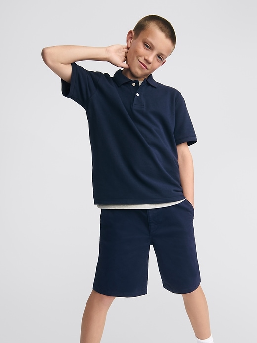 L'image numéro 4 présente Polo d’uniforme pour Enfant