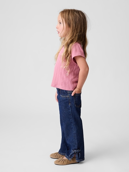 Image number 1 showing, Baby & Toddler Bow Split-Hem Stride Jeans