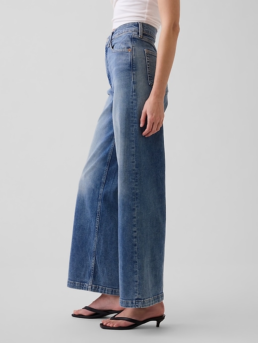L'image numéro 3 présente Jean sportif jambe large à taille haute longueur cheville